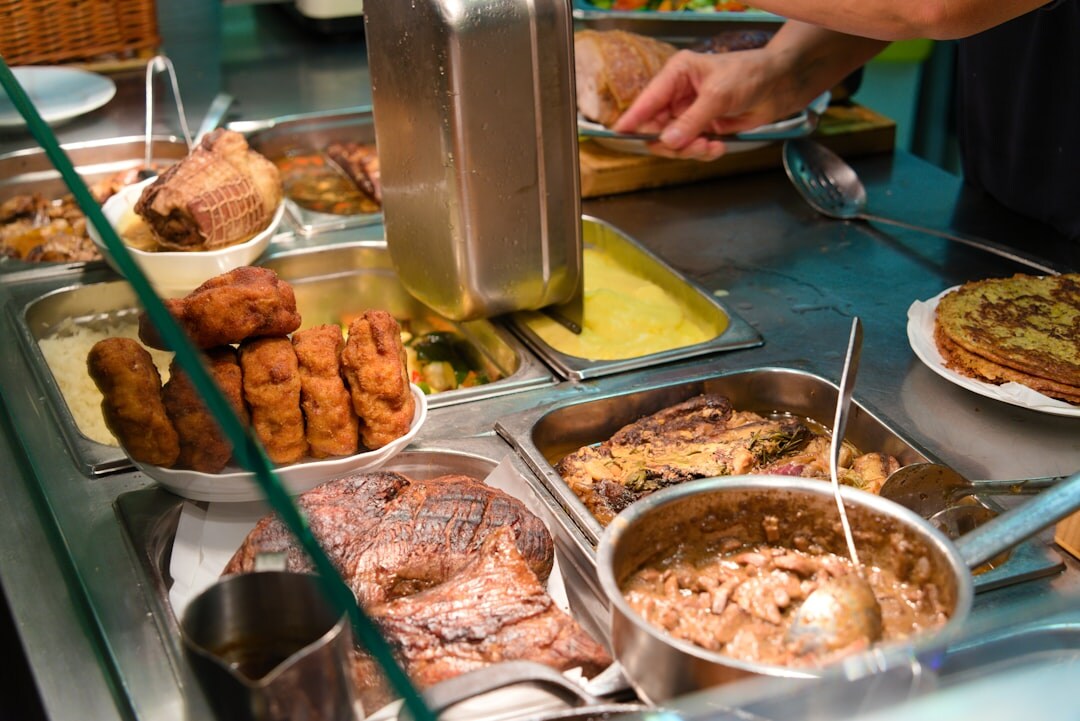 Traditional Czech Sunday lunch table with roast meat, dumplings and gravy