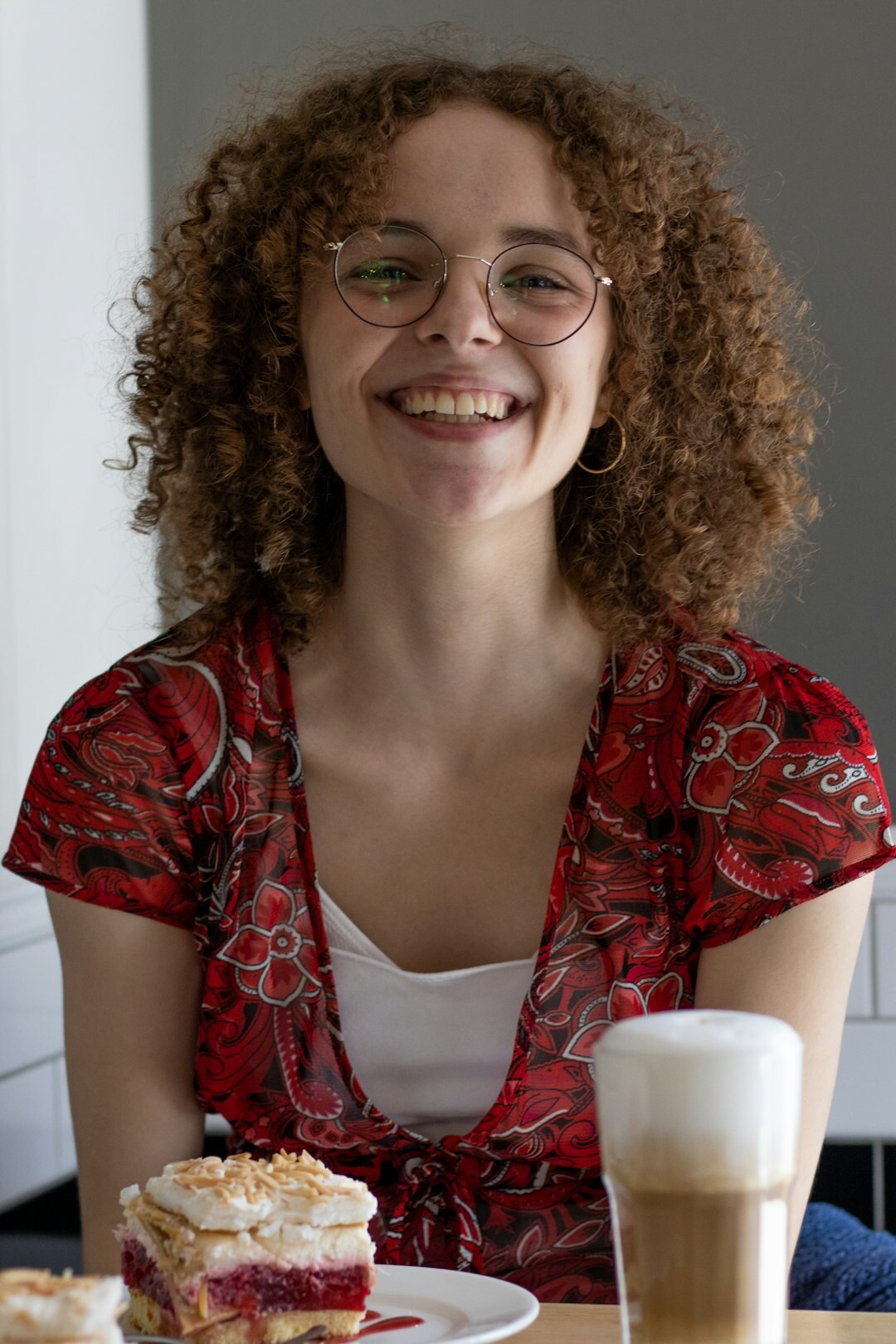 Portrait of a Czech female food editor smiling in a kitchen